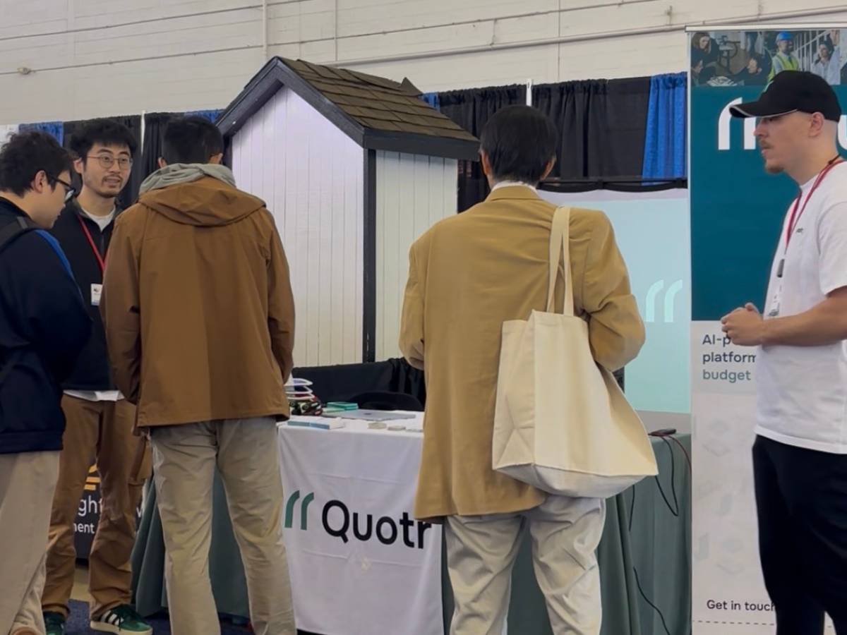 Contractors interacting at Quotr booth during Dallas Build Expo 2026