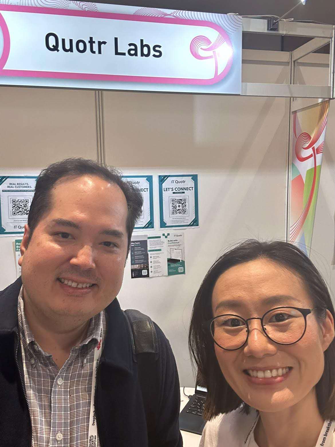 At the Quotr Labs booth during Global Startup EXPO 2026. Two people at the Quotr Labs booth during Global Startup EXPO 2026.