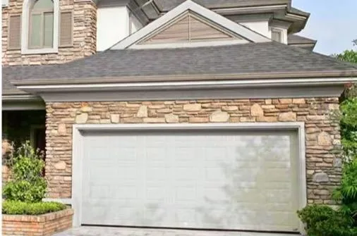 Steel garage door with white raised panel